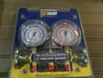 Yellow Jacket 41712 Valve Manifold Red & Blue Guages R-410A. Fixed Price $89.00.