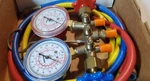 Robinair (40153) Side-wheel Manifold Gauge With 1/4" Fittings And 36" Hose Set. Fixed Price $201.99.