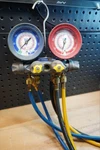Yellow Jacket 49963 Titan Valve Test And Charging Manifold - With Hoses. Fixed Price $169.87.